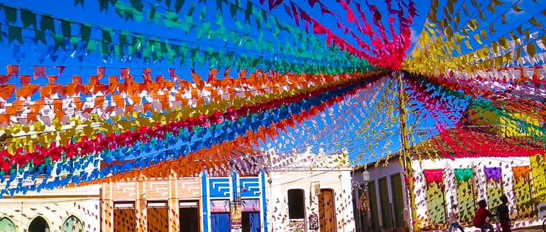 Colorful banners in the historic streets of Lençóis during the São João festival in Chapada Diamantina.